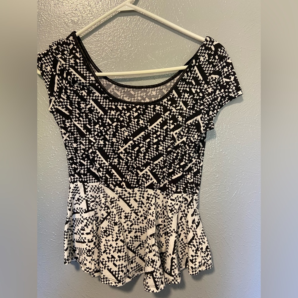Black and white patterned top.